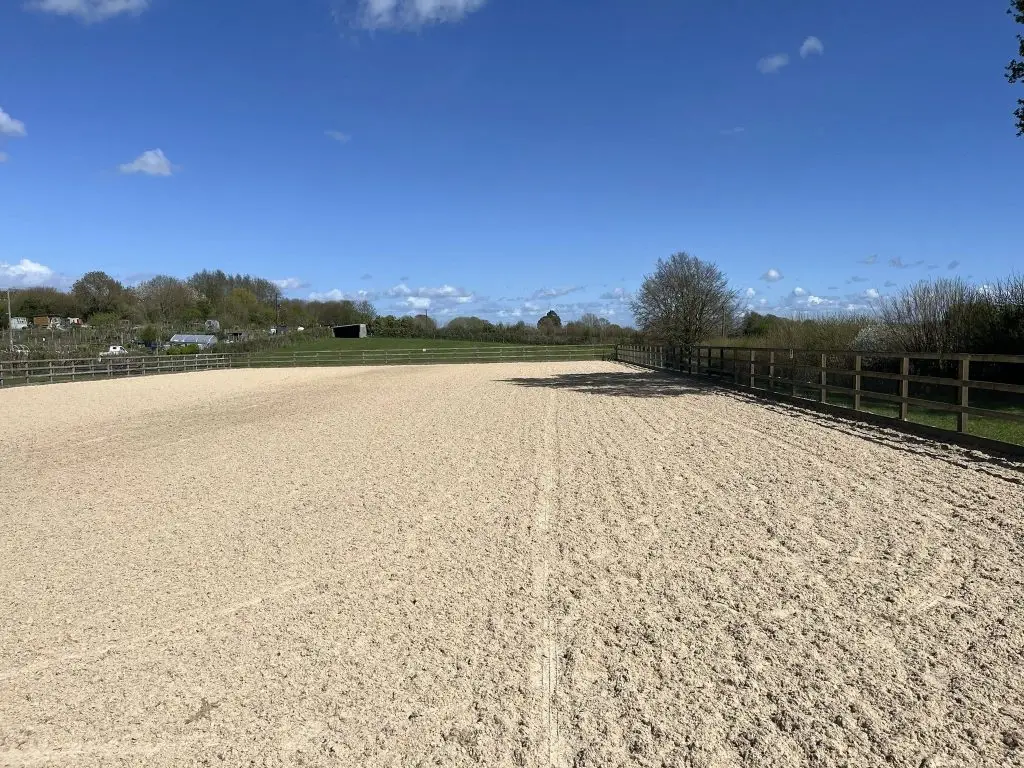 A renovated riding arena surface